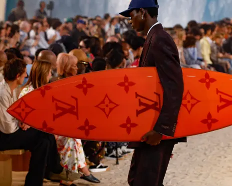 Louis Vuitton brings the beach to Paris in near 40C heat
