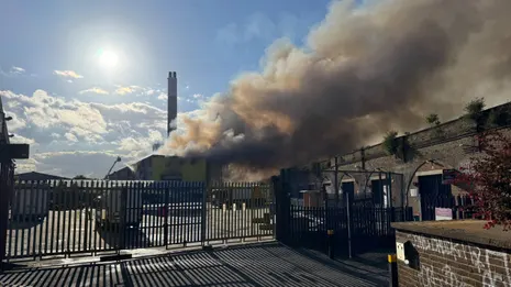 Scores of firefighters tackle major blaze at south London recycling centre