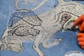 ‘What happened to the testicles?’: mockery in Milan over bull mosaic’s restoration