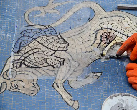 ‘What happened to the testicles?’: mockery in Milan over bull mosaic’s restoration