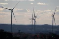Australians value batteries and EVs, but renewables industry must earn trust of regions, summit told