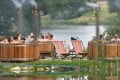 Hot tubs and £80 rosé: how the mud-soaked British festival got a luxury makeover