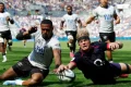 Pollock’s hat-trick powers England’s 11-try Nations Championship mauling of 14-man Fiji