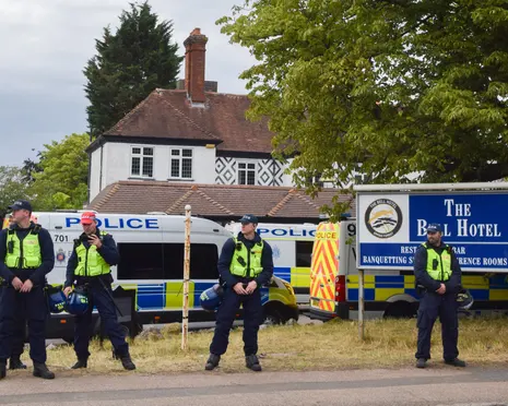 Number of asylum seekers living in hotels across UK halves in a year