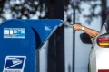 US Postal Service rule tightens mail-in voting despite court orders blocking changes