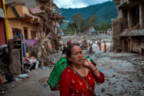 Nepal-Tibet deaths from flash flooding rise amid race to free workers in tunnel