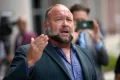 Texas slashes $50m judgment against Alex Jones over false claim Sandy Hook shooting was hoax